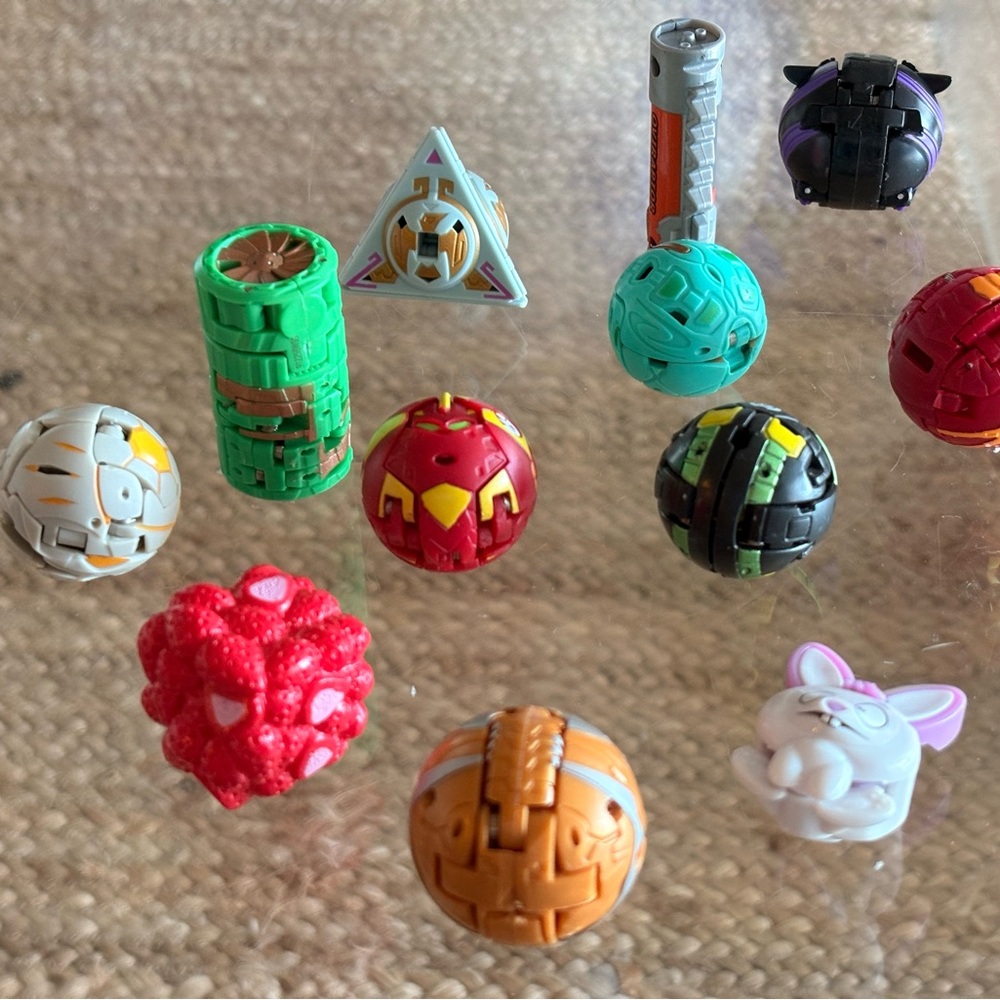 Bakugan Colorful Transforming Toys mixed with other toys